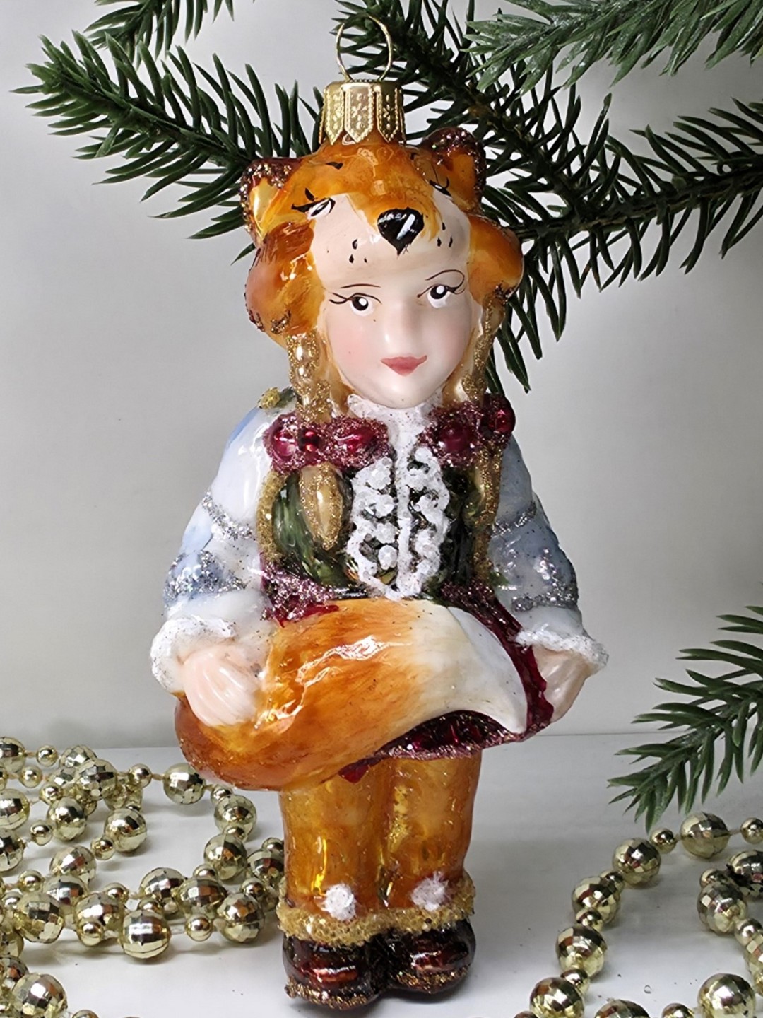фото Стеклянная елочная игрушка Девочка Лисичка
