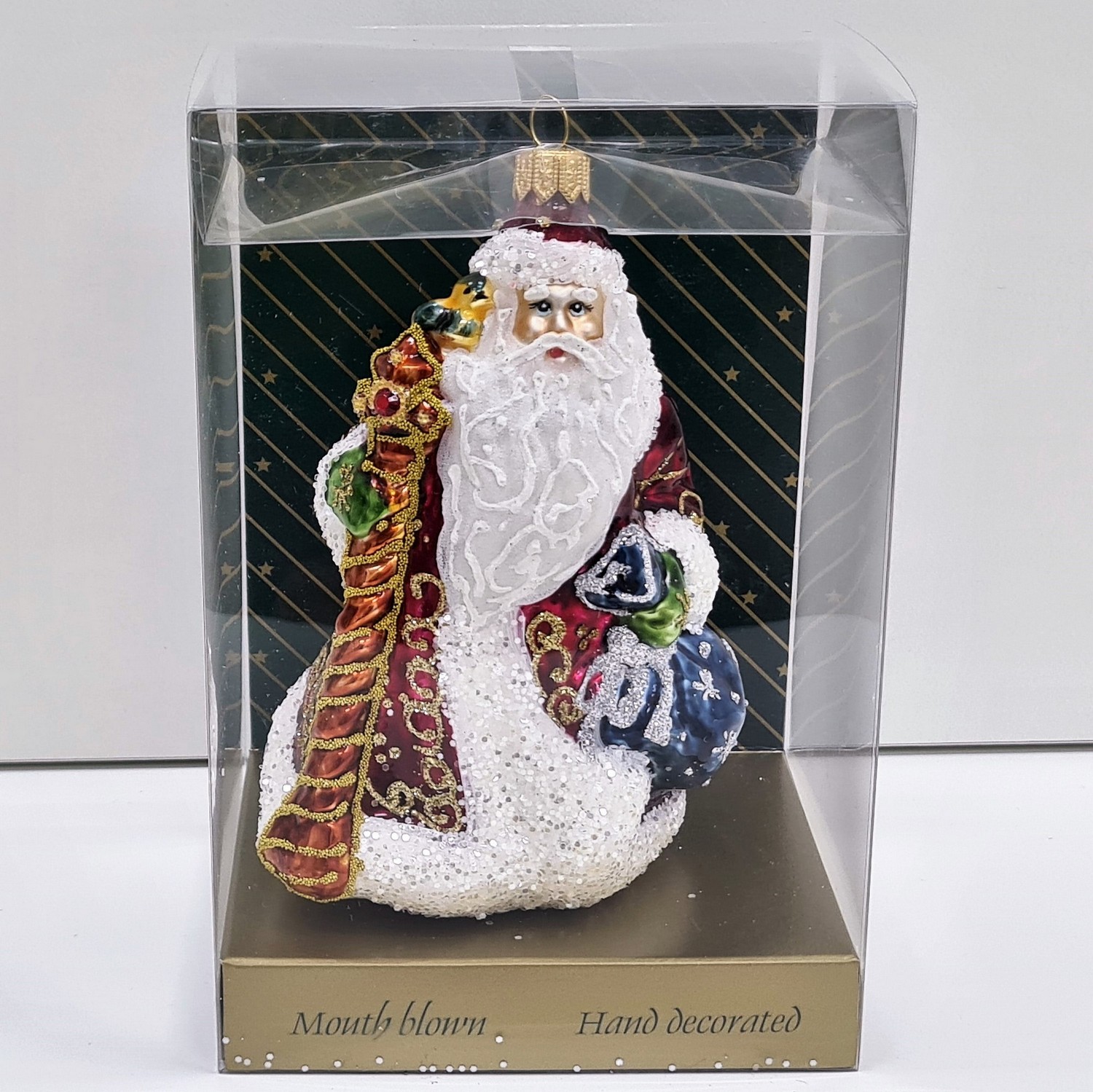 фото Стеклянная елочная игрушка Дед Мороз с мешком