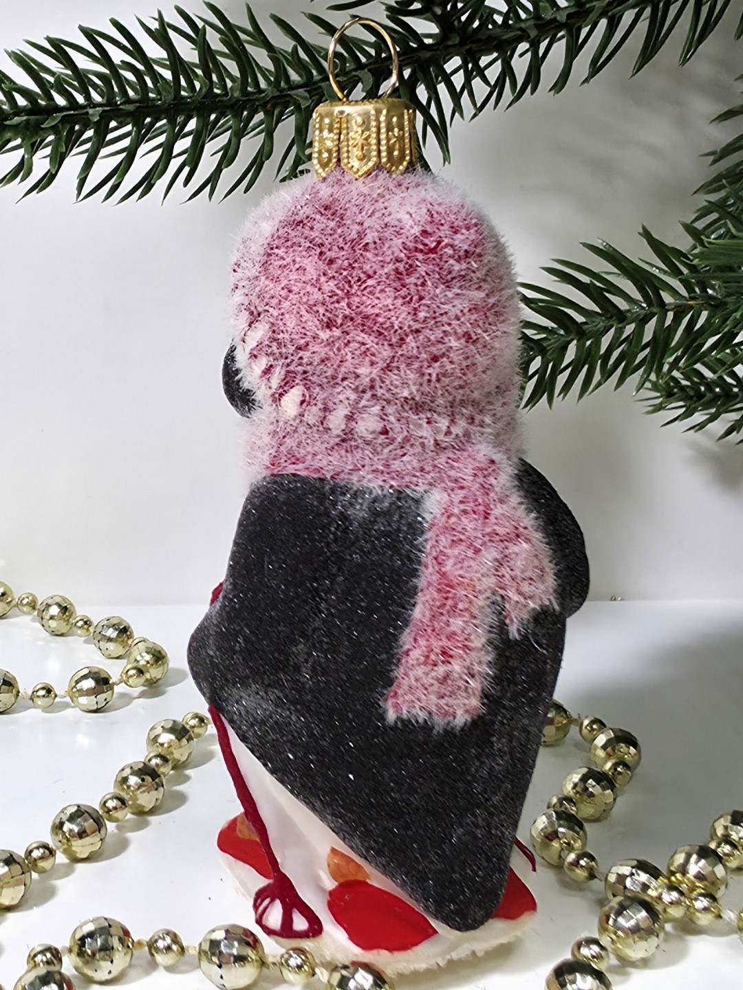 фото Стеклянная елочная игрушка Пингвин на лыжах