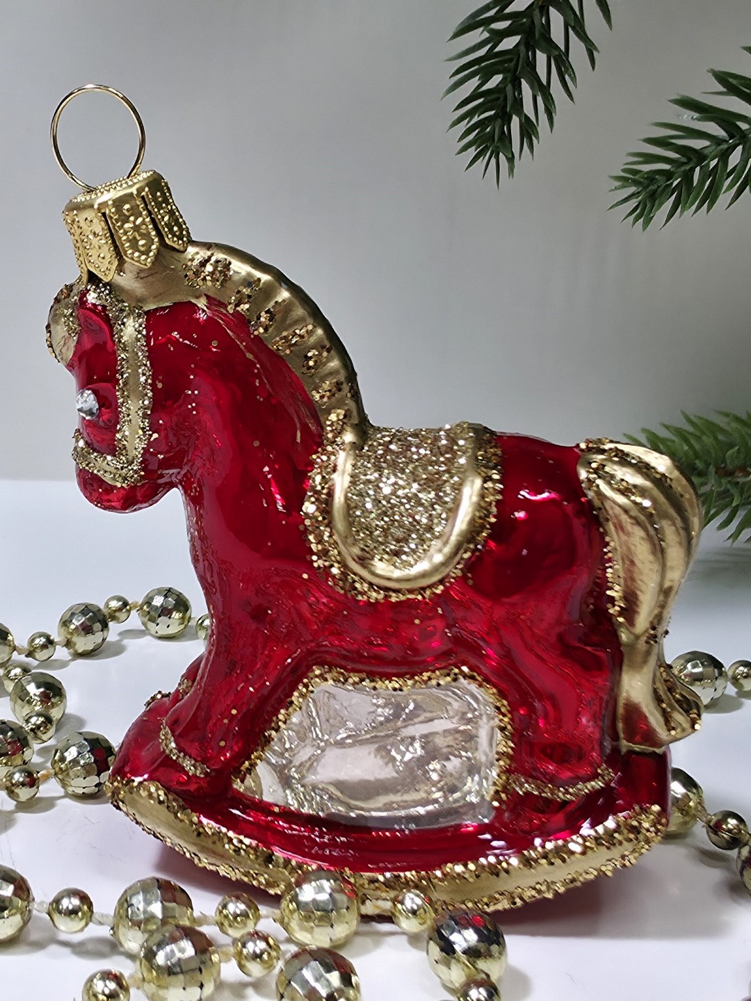 фото Стеклянная елочная игрушка Лошадка качалка