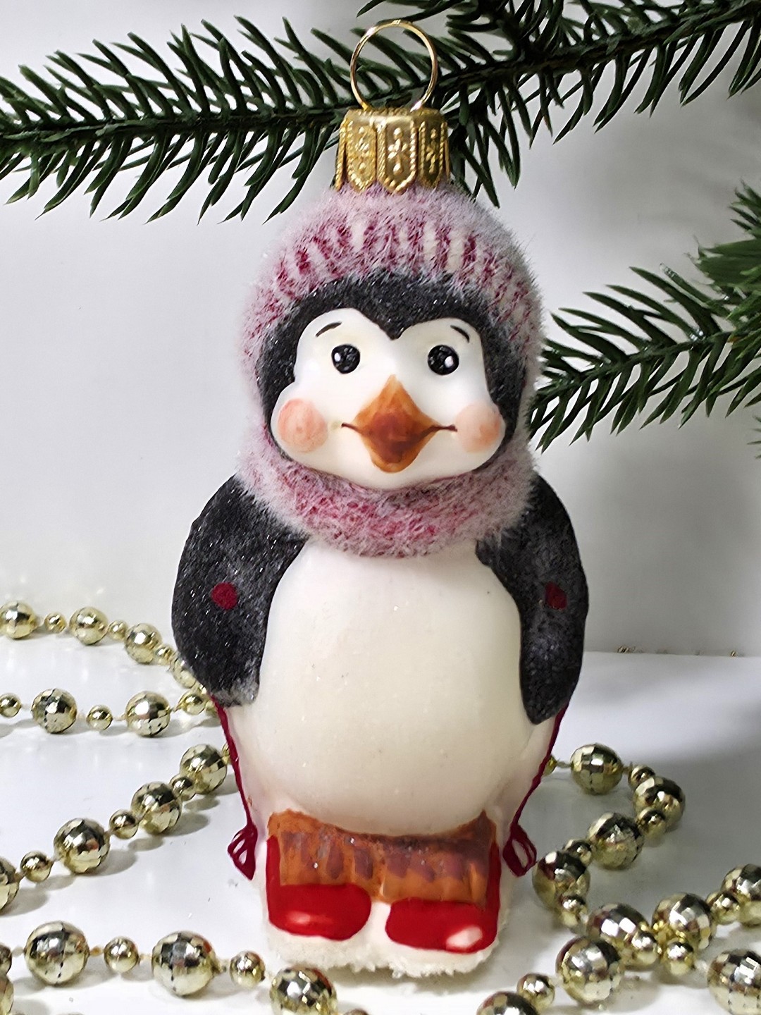 фото Стеклянная елочная игрушка Пингвин на лыжах