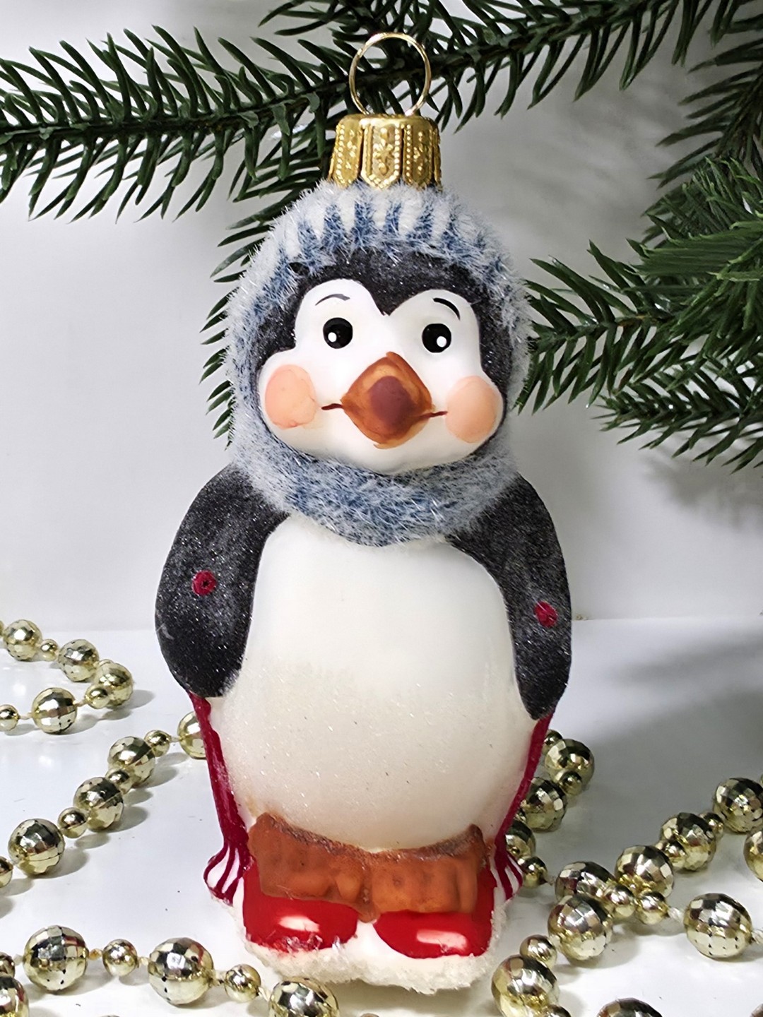 фото Стеклянная елочная игрушка Пингвин на лыжах