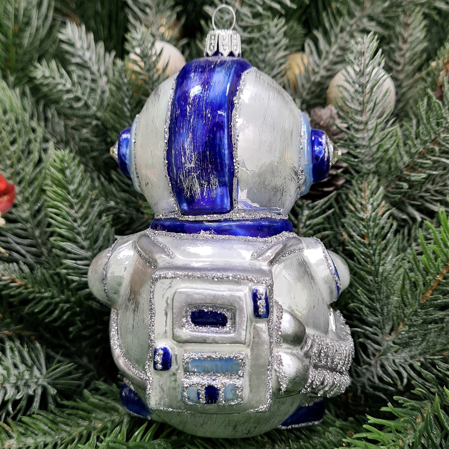 фото Стеклянная елочная игрушка Снеговик космонавт синий
