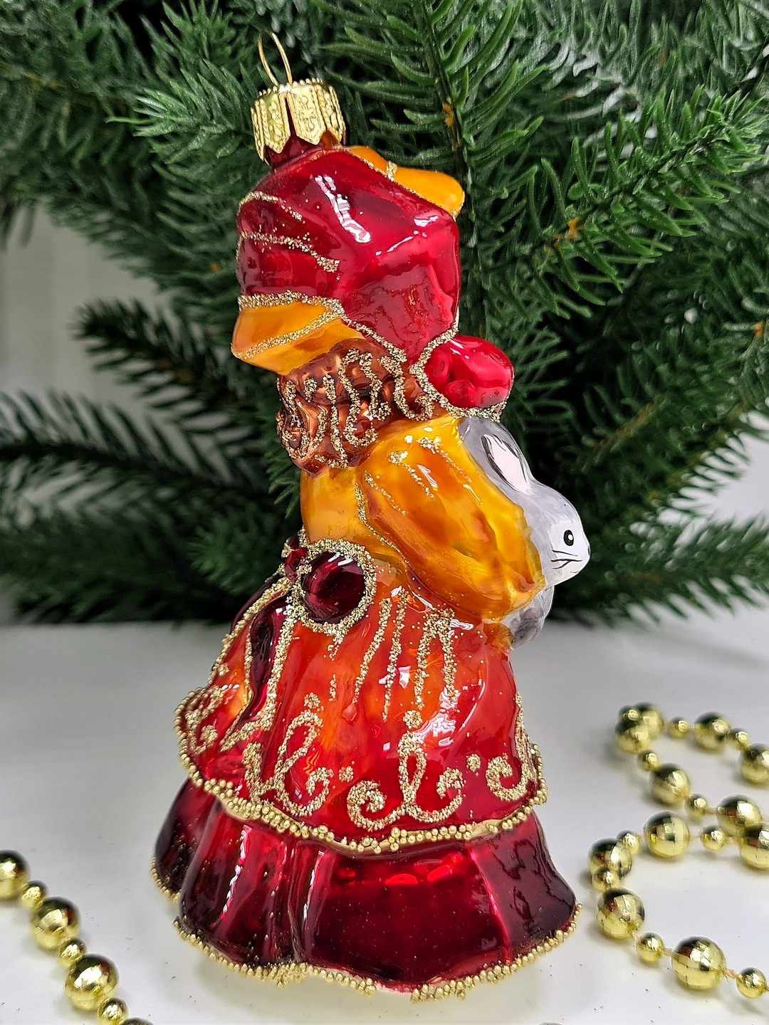 фото Стеклянная елочная игрушка Девочка с кроликом