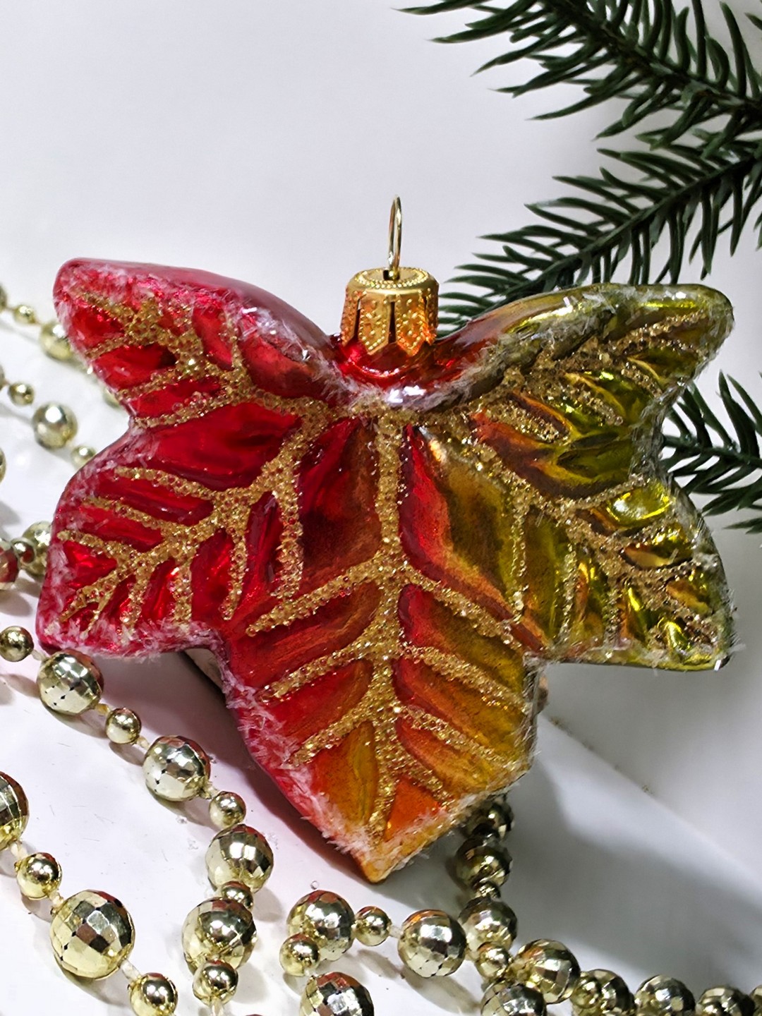 фото Стеклянная елочная игрушка Кленовый лист