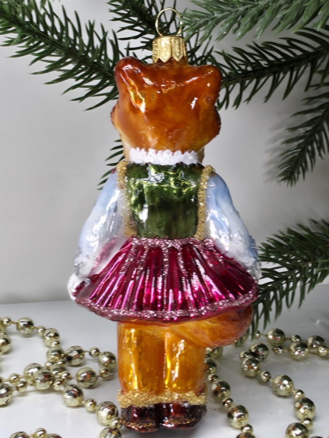 фото Стеклянная елочная игрушка Девочка Лисичка