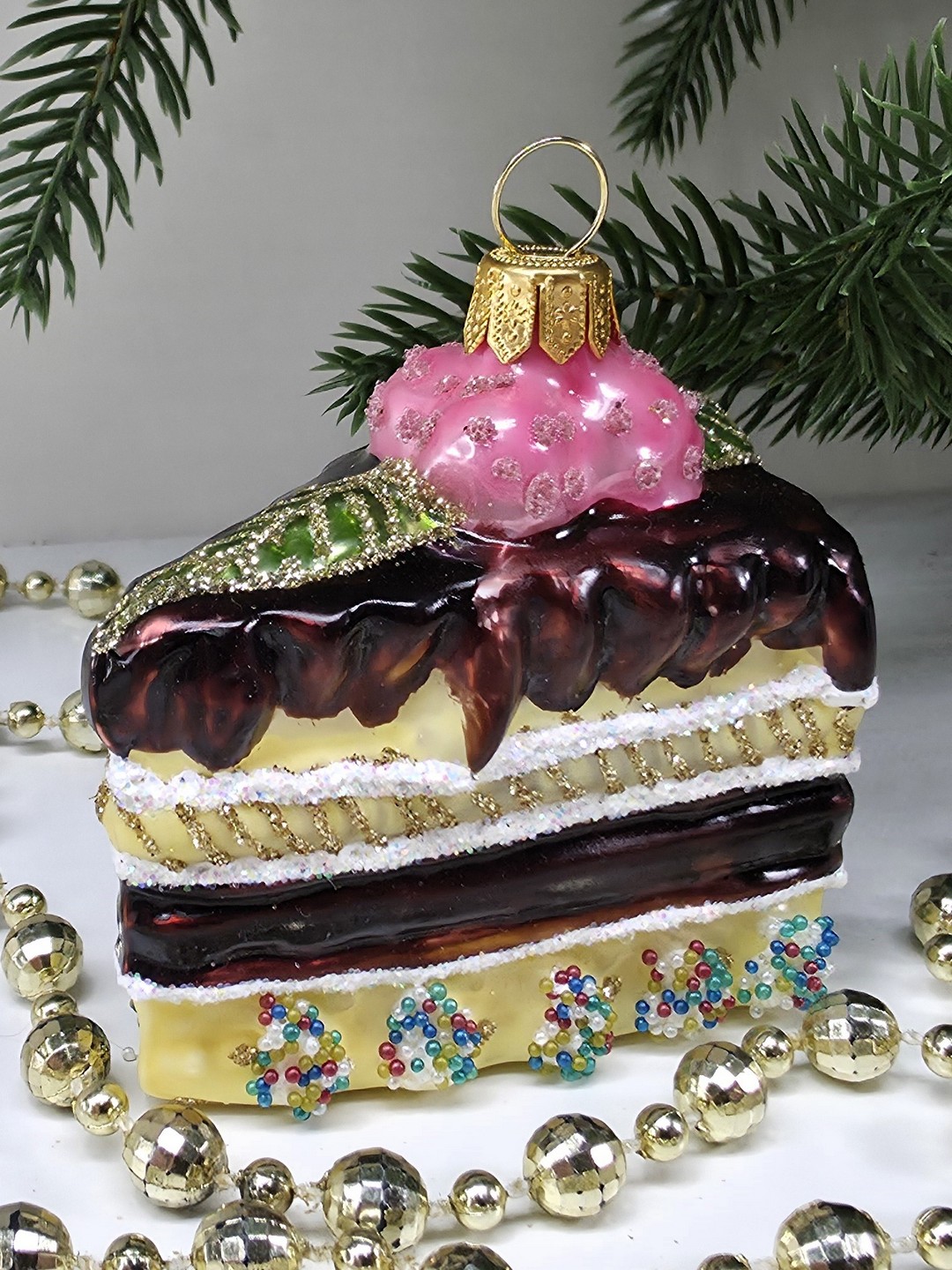 фото Стеклянная елочная игрушка Кусок торта