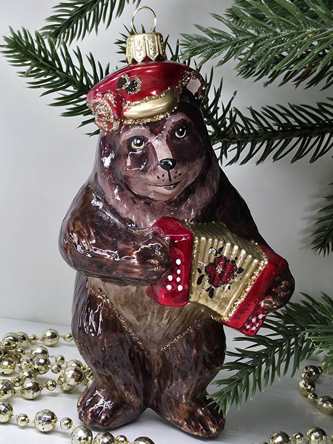 фото Стеклянная елочная игрушка Мишка с гармошкой