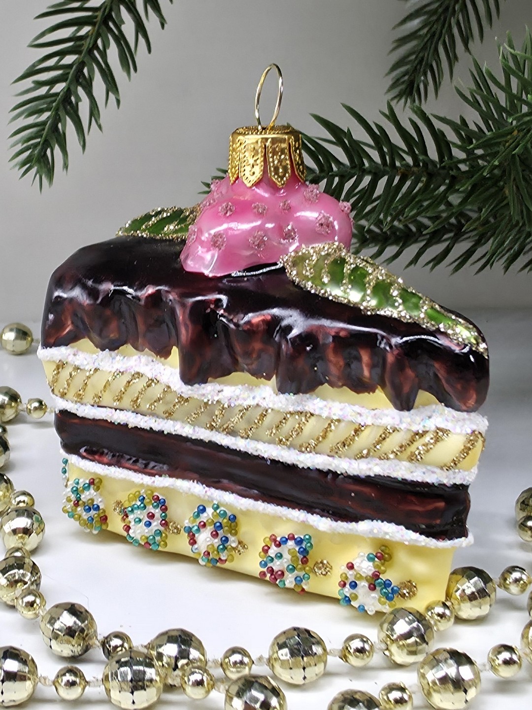 фото Стеклянная елочная игрушка Кусок торта