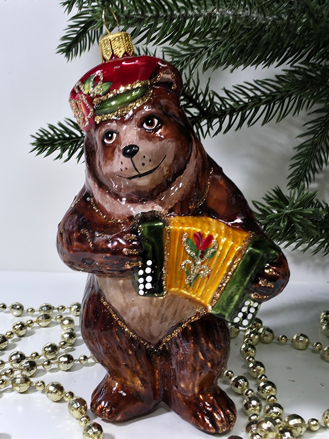 фото Стеклянная елочная игрушка Мишка с гармошкой