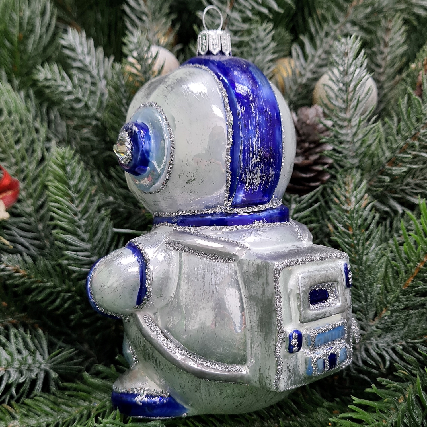фото Стеклянная елочная игрушка Снеговик космонавт синий