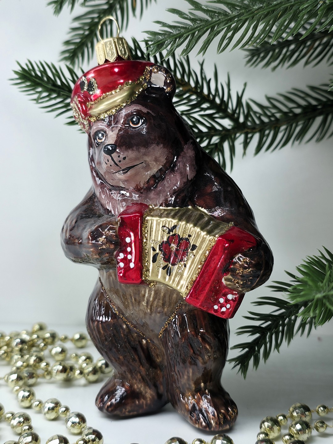 фото Стеклянная елочная игрушка Мишка с гармошкой