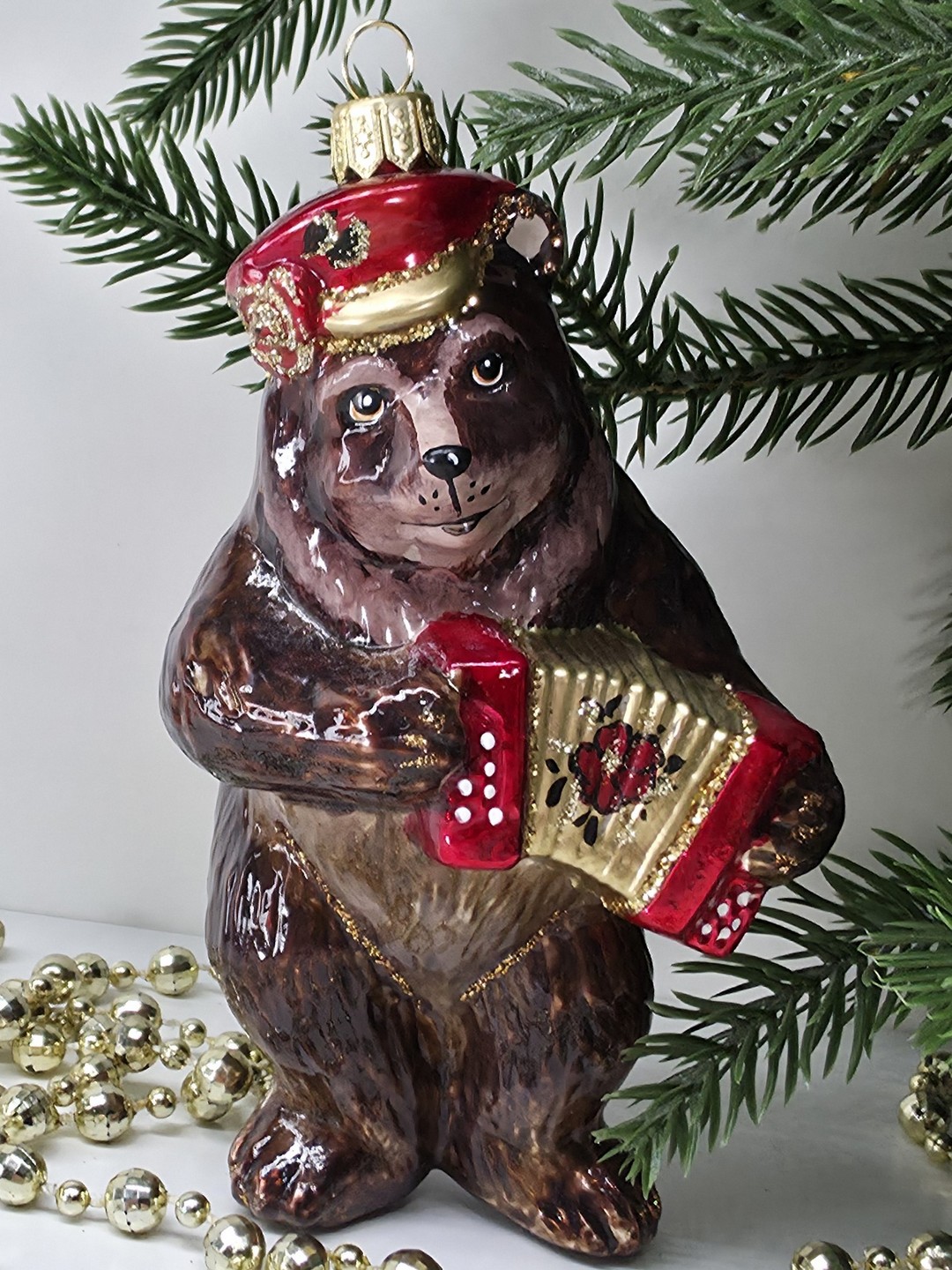 фото Стеклянная елочная игрушка Мишка с гармошкой