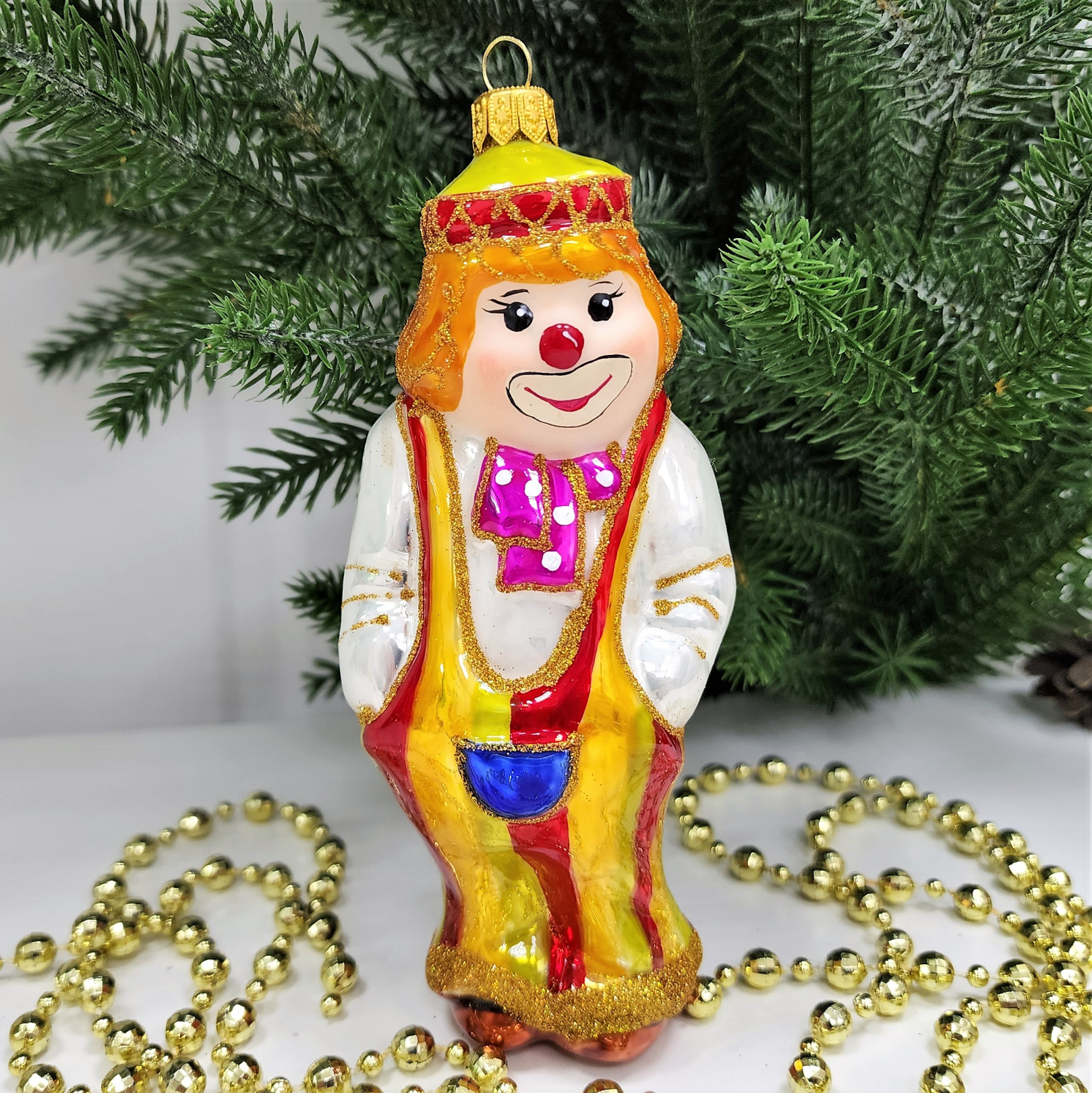 фото Стеклянная елочная игрушка Клоун с бантом