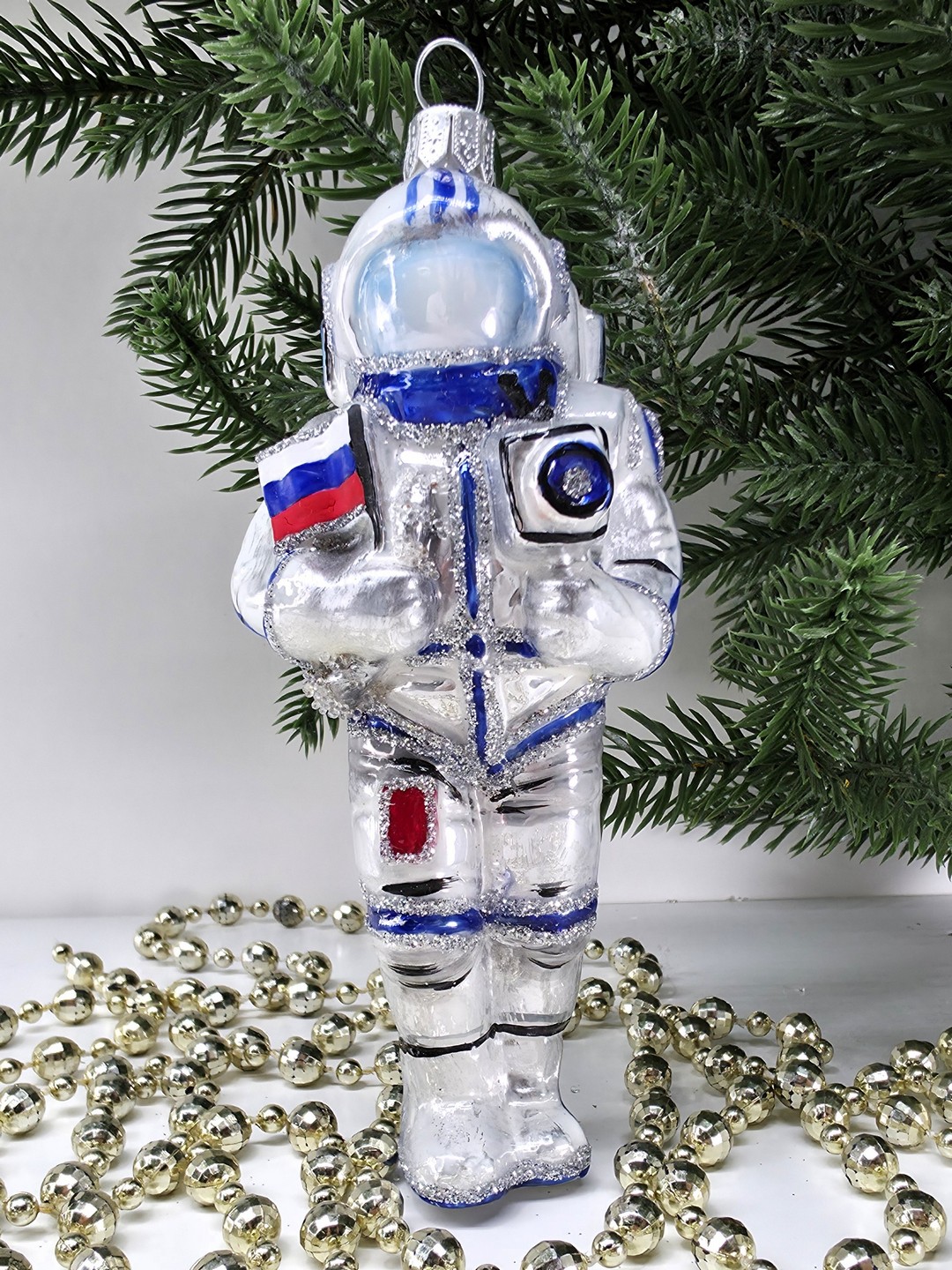фото Стеклянная елочная игрушка Космонавт