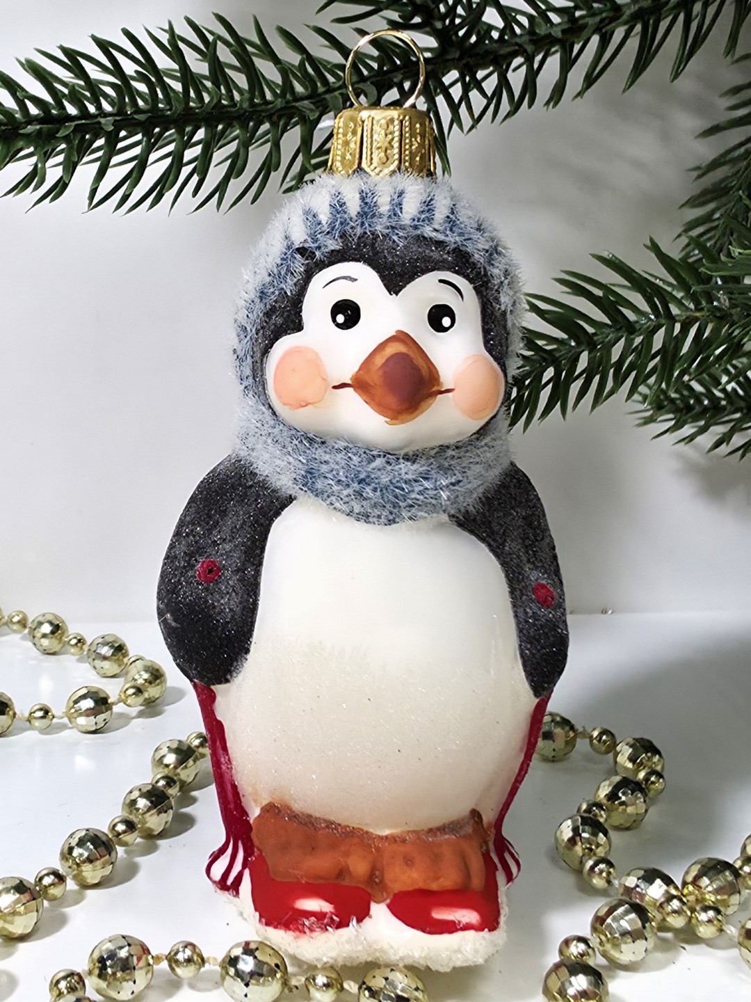 фото Стеклянная елочная игрушка Пингвин на лыжах