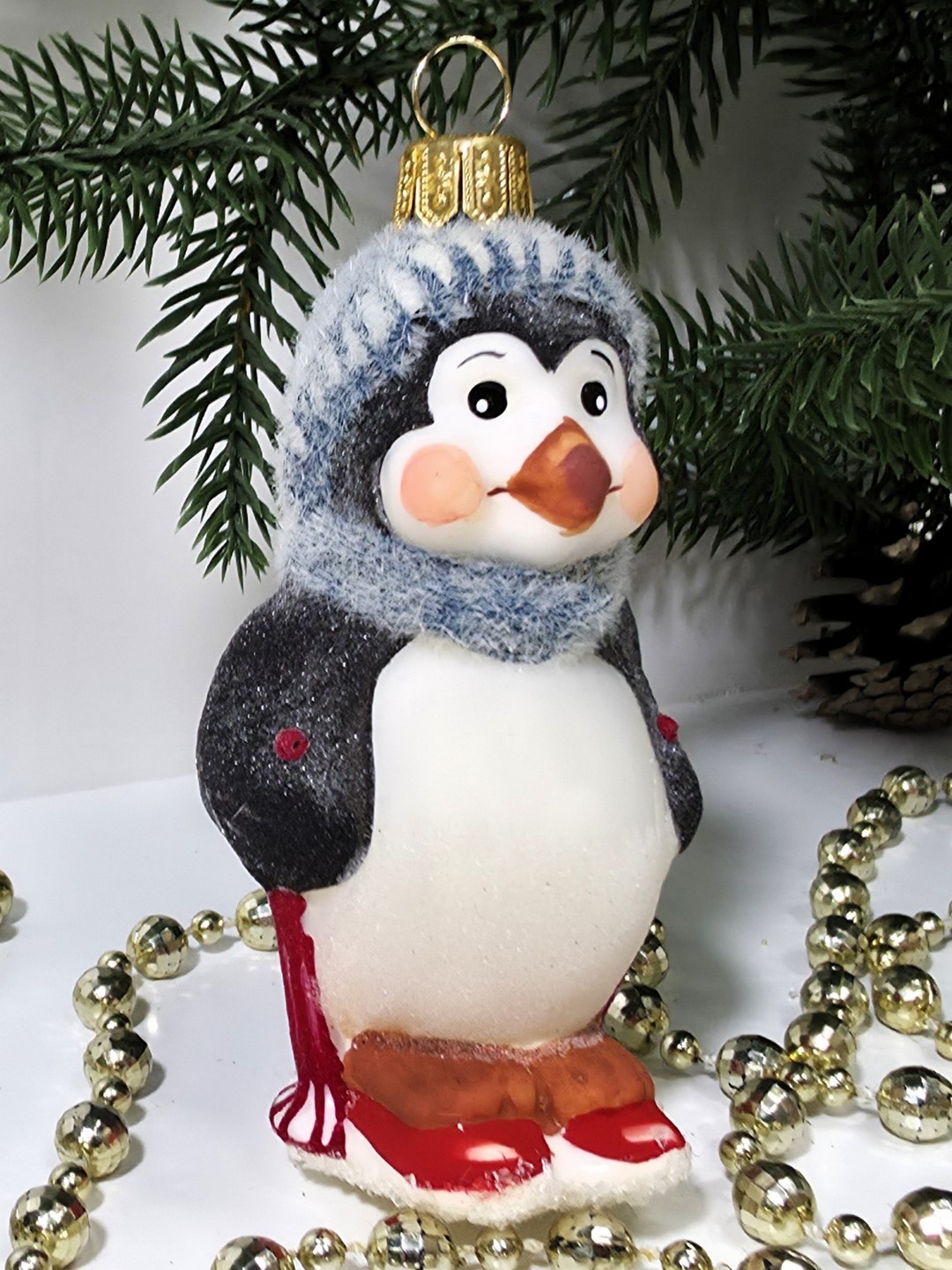 фото Стеклянная елочная игрушка Пингвин на лыжах