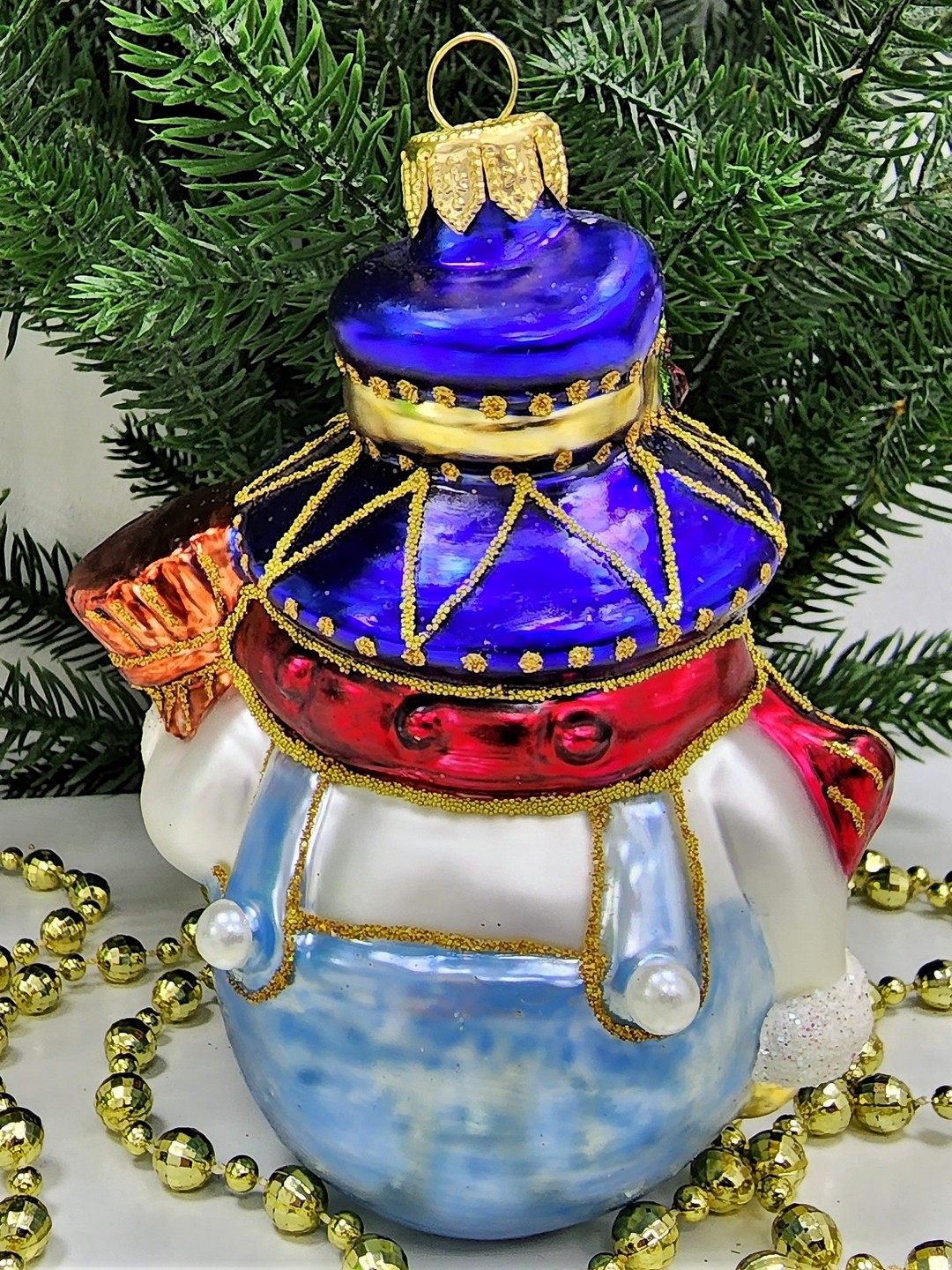 фото Стеклянная елочная игрушка Снеговик цирковой
