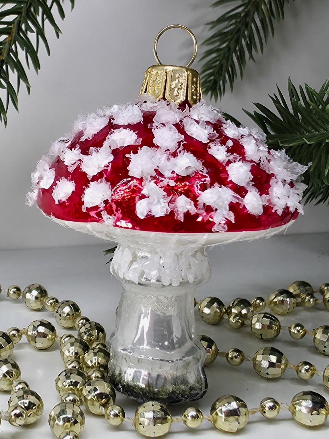 фото Стеклянная елочная игрушка Мухомор