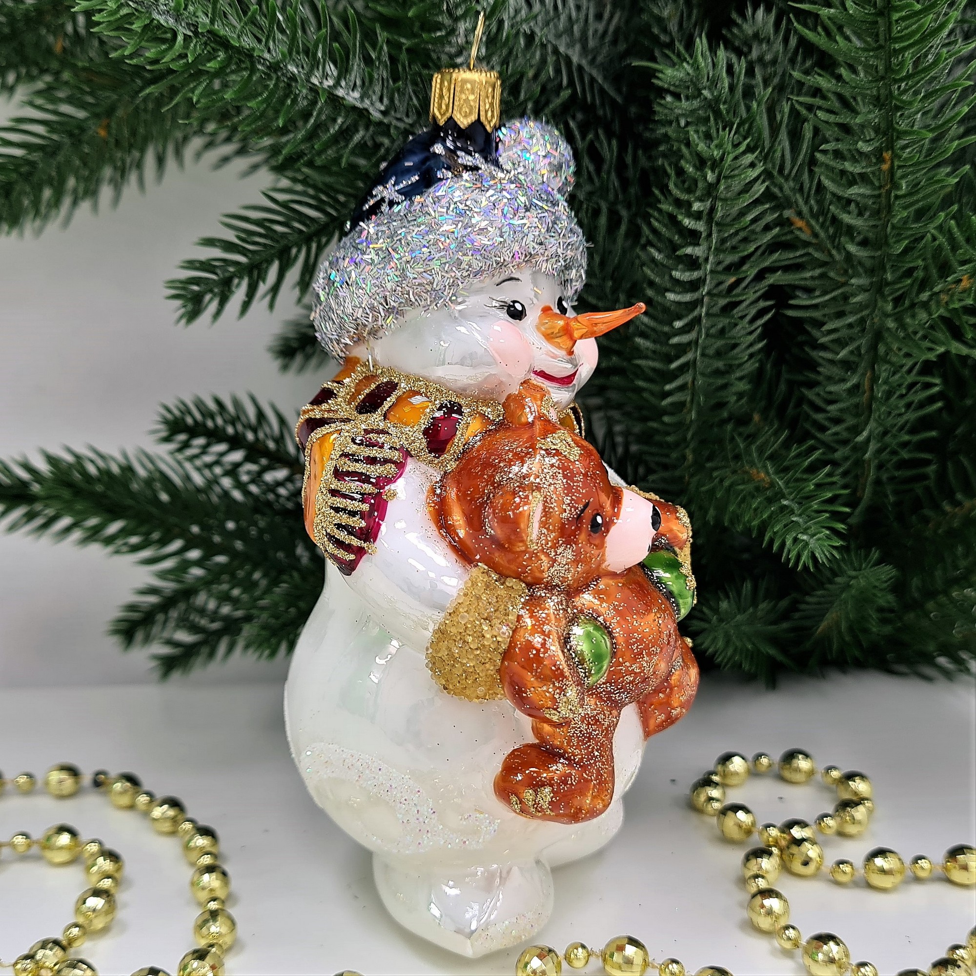фото Стеклянная елочная игрушка Снеговик с мишкой