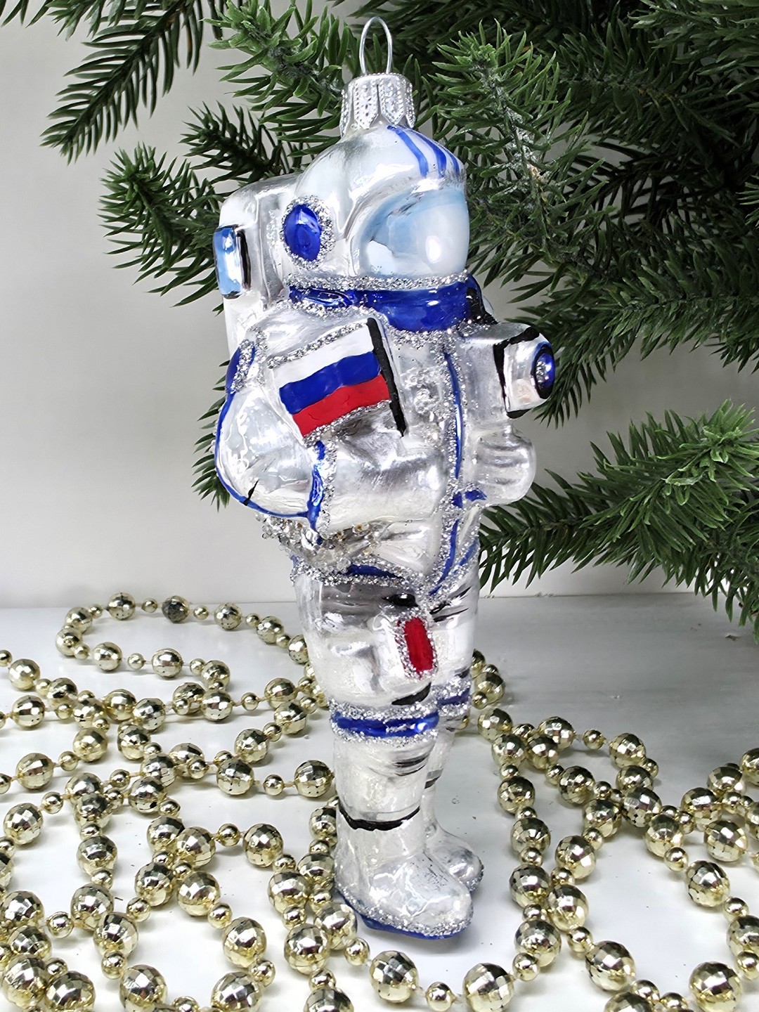 фото Стеклянная елочная игрушка Космонавт