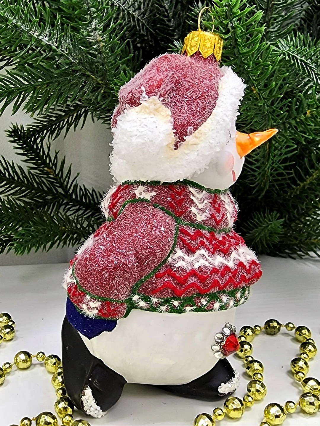 фото Стеклянная елочная игрушка Снеговик в свитере