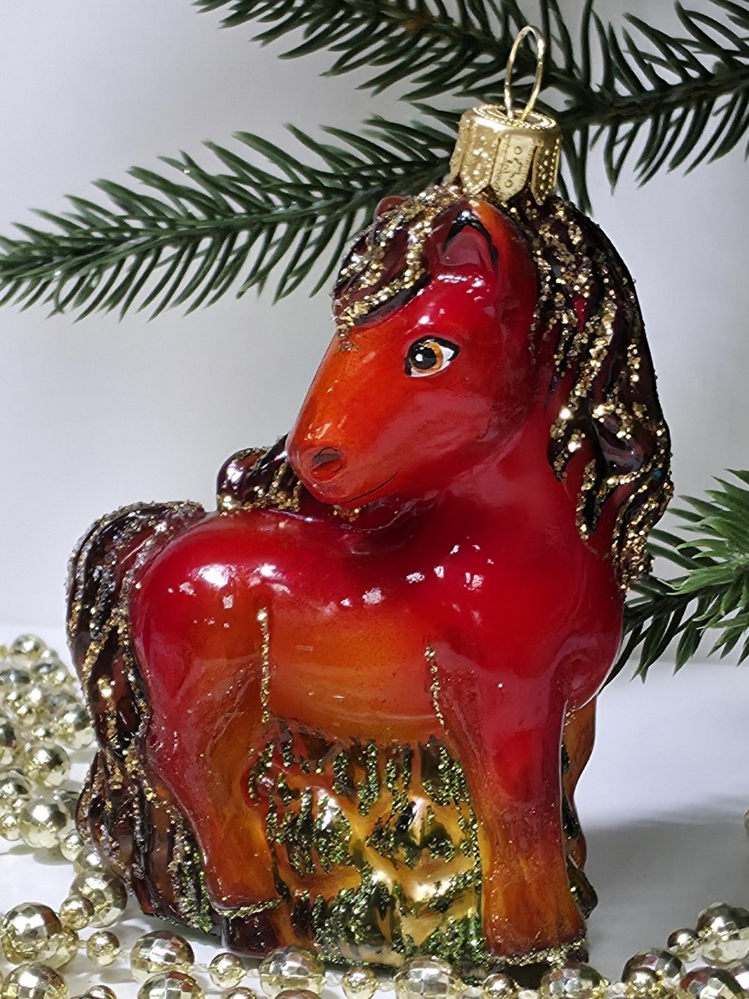 фото Стеклянная елочная игрушка Лошадка смотрит в бок