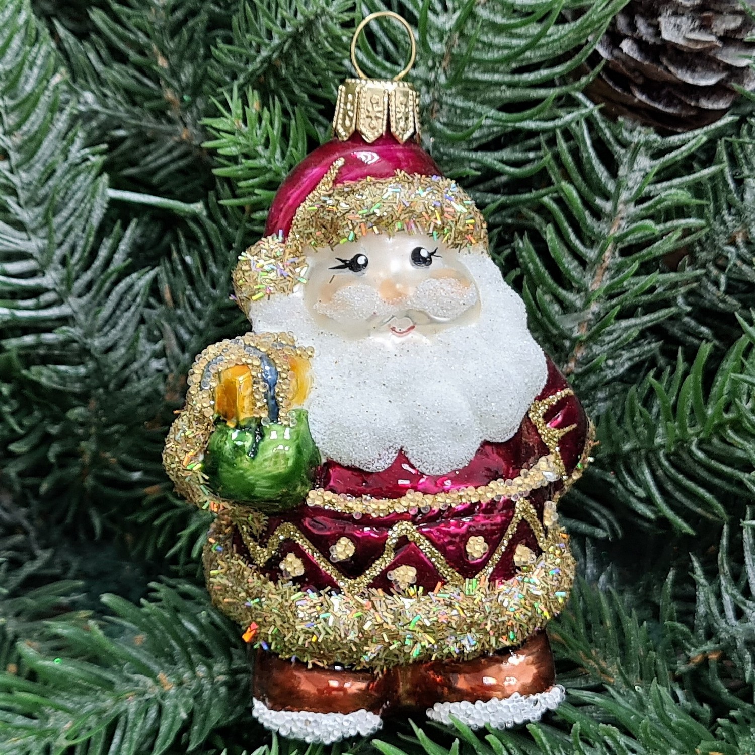 фото Стеклянная елочная игрушка Санта с подарком малый