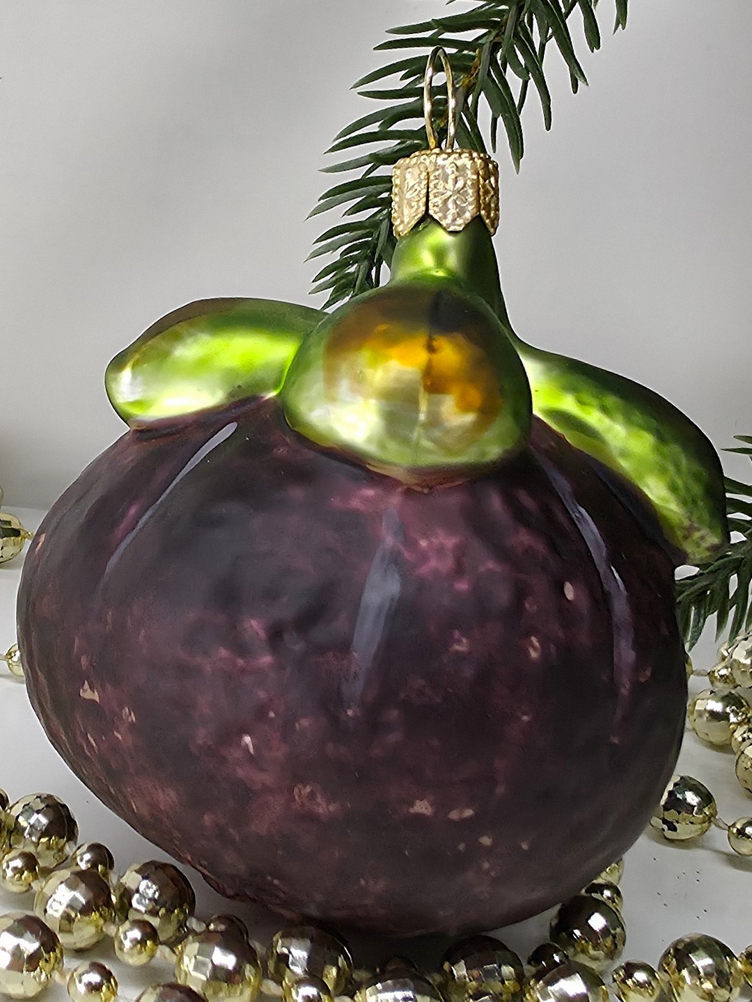 фото Стеклянная елочная игрушка Мангостин