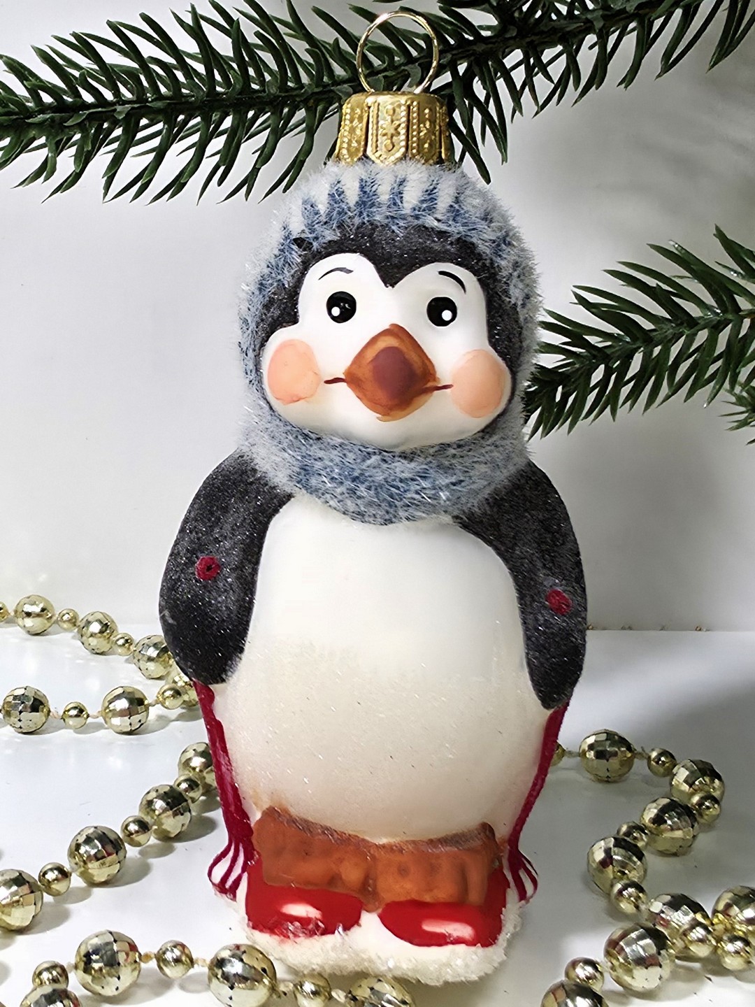 фото Стеклянная елочная игрушка Пингвин на лыжах