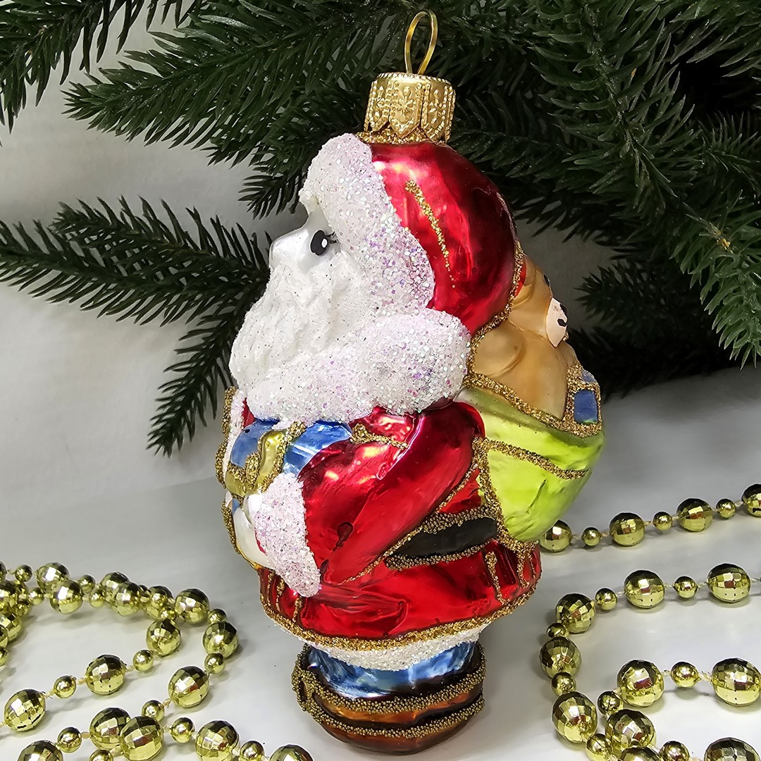 фото Стеклянная елочная игрушка Дед Мороз с подарками