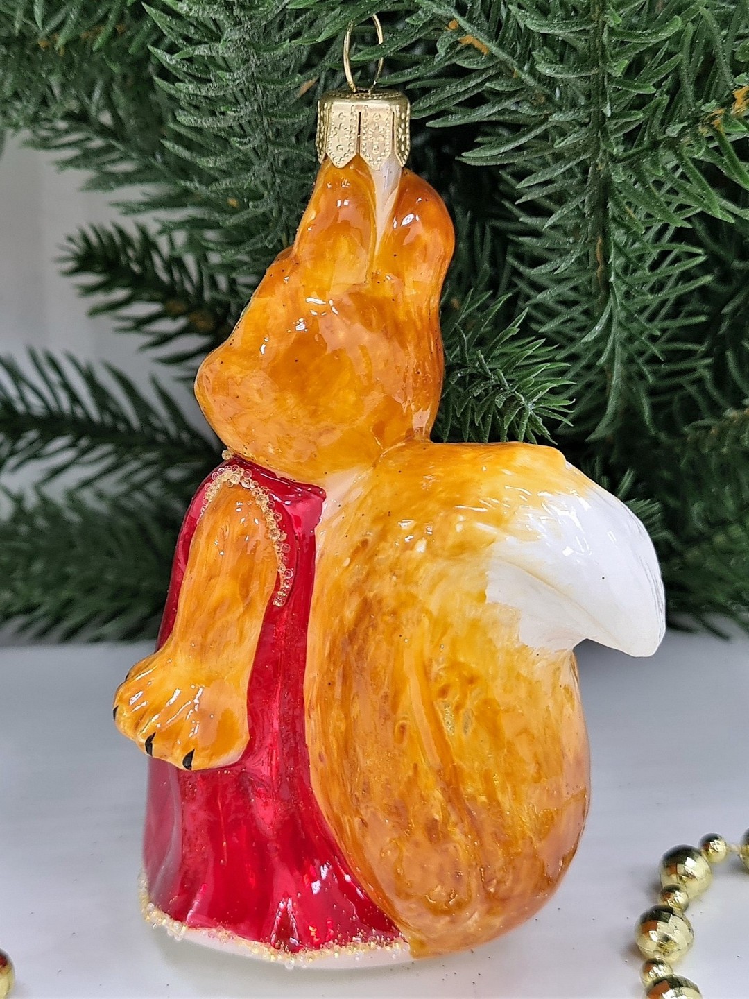 фото Стеклянная елочная игрушка Белочка с корзинкой