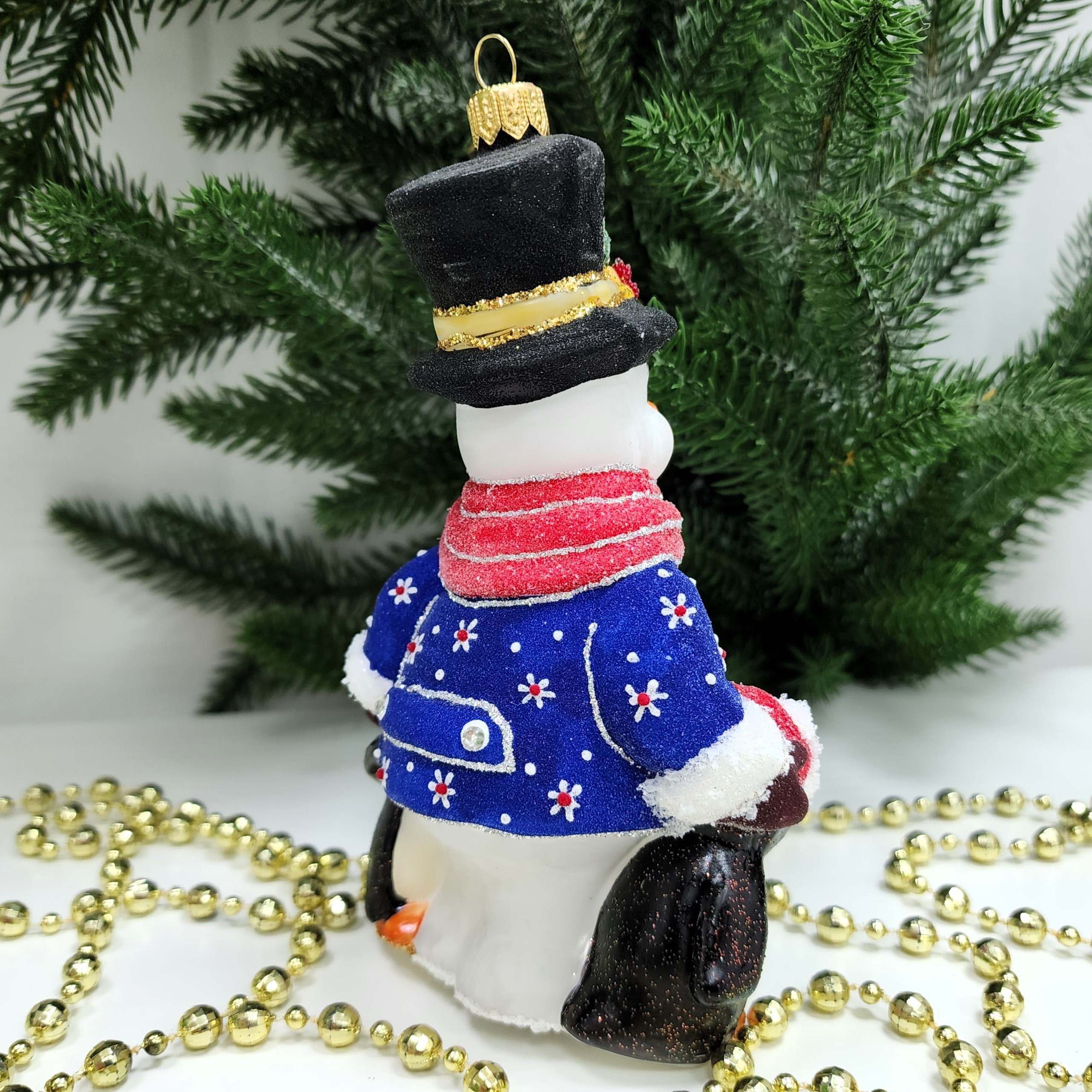 фото Стеклянная елочная игрушка Снеговик с пингвинами