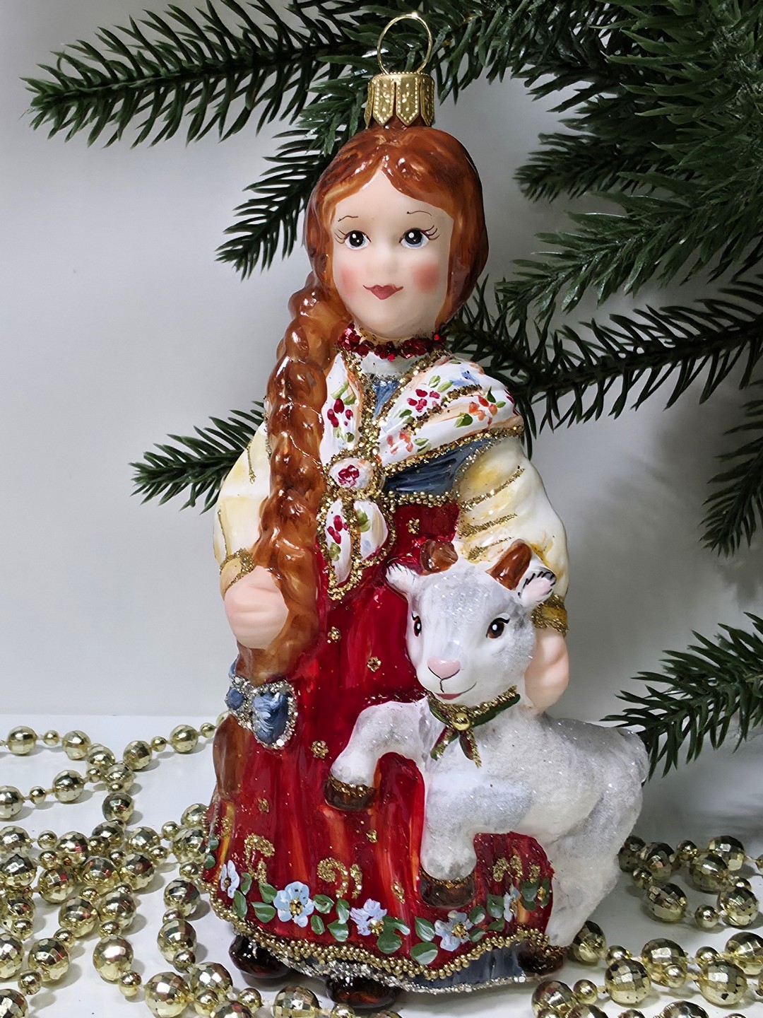фото Стеклянная елочная игрушка Аленушка с козленком