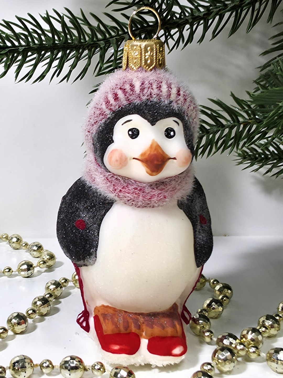 фото Стеклянная елочная игрушка Пингвин на лыжах