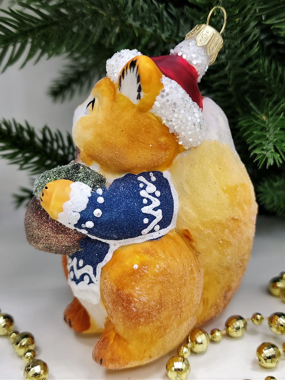 фото Стеклянная елочная игрушка Белочка с орехом