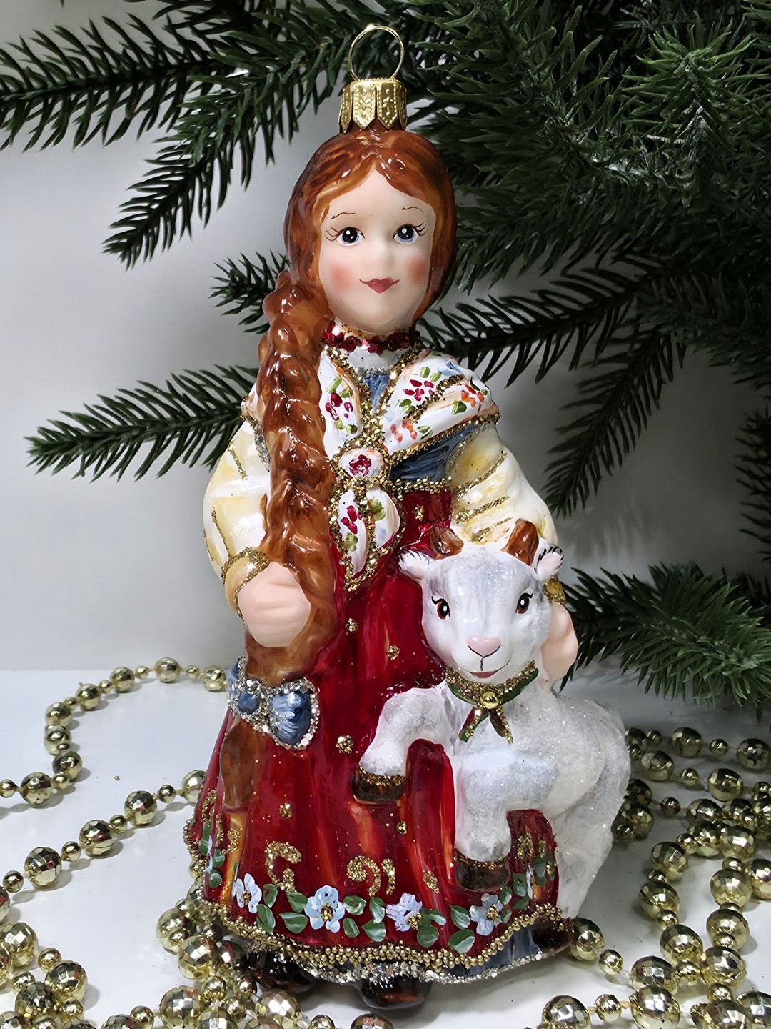 фото Стеклянная елочная игрушка Аленушка с козленком