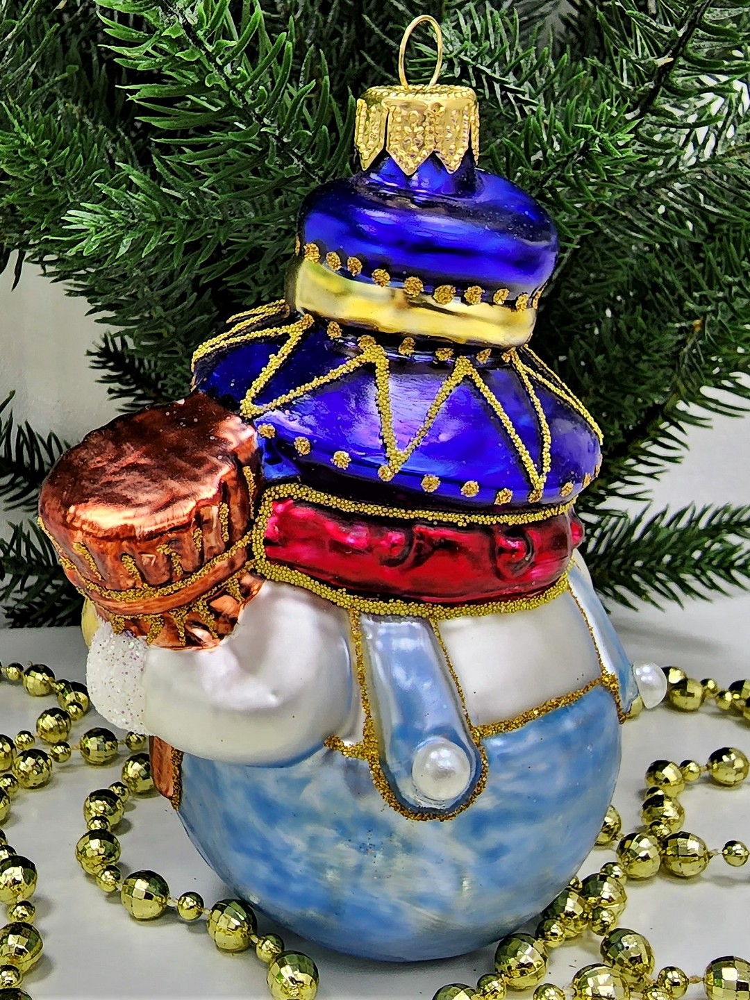 фото Стеклянная елочная игрушка Снеговик цирковой