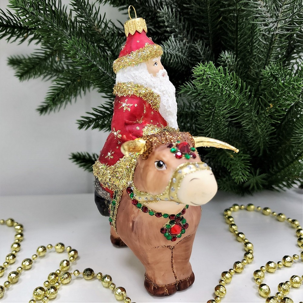 фото Стеклянная елочная игрушка Дед Мороз на быке