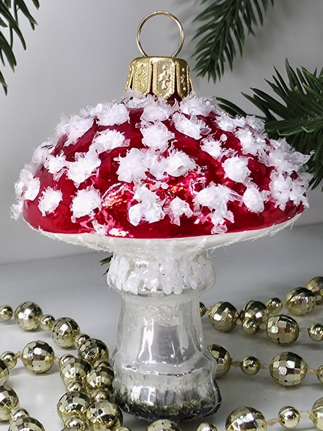 фото Стеклянная елочная игрушка Мухомор