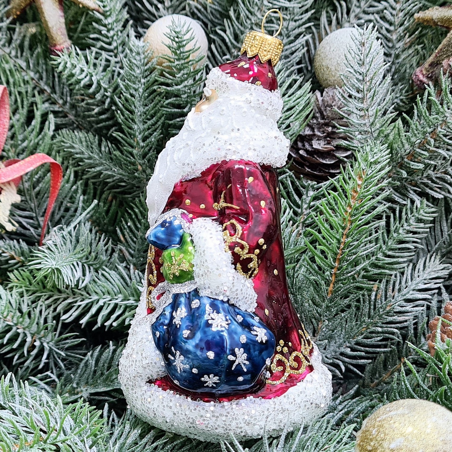фото Стеклянная елочная игрушка Дед Мороз с мешком