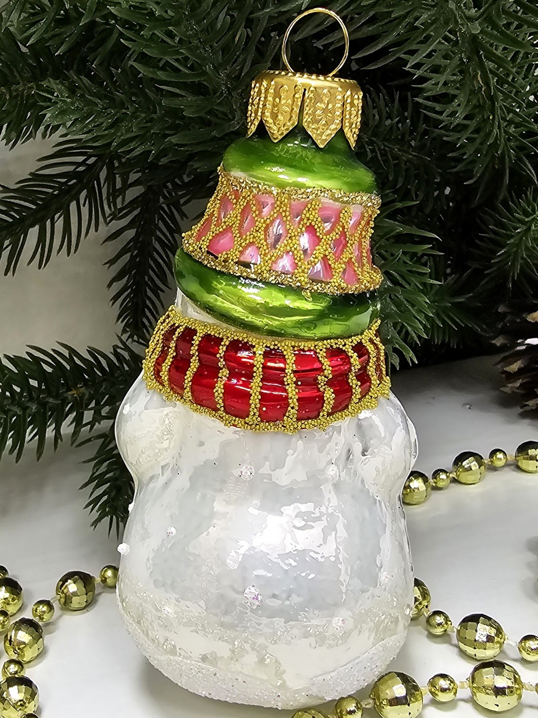 фото Стеклянная елочная игрушка Снеговик в шляпке