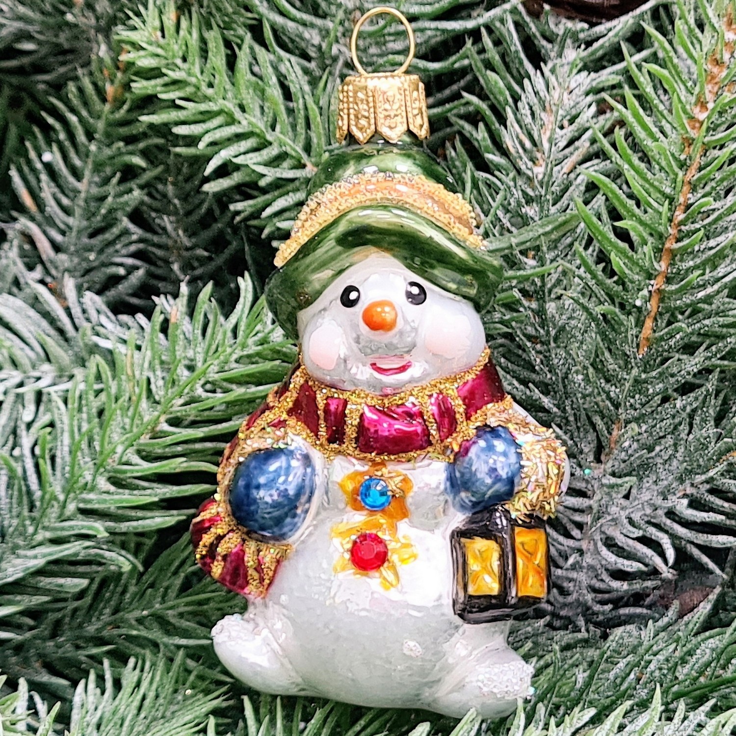 фото Стеклянная елочная игрушка Снеговик с фонариком