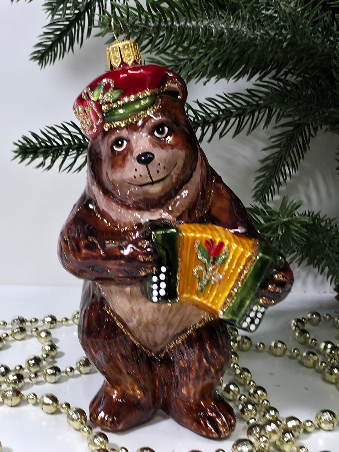 фото Стеклянная елочная игрушка Мишка с гармошкой