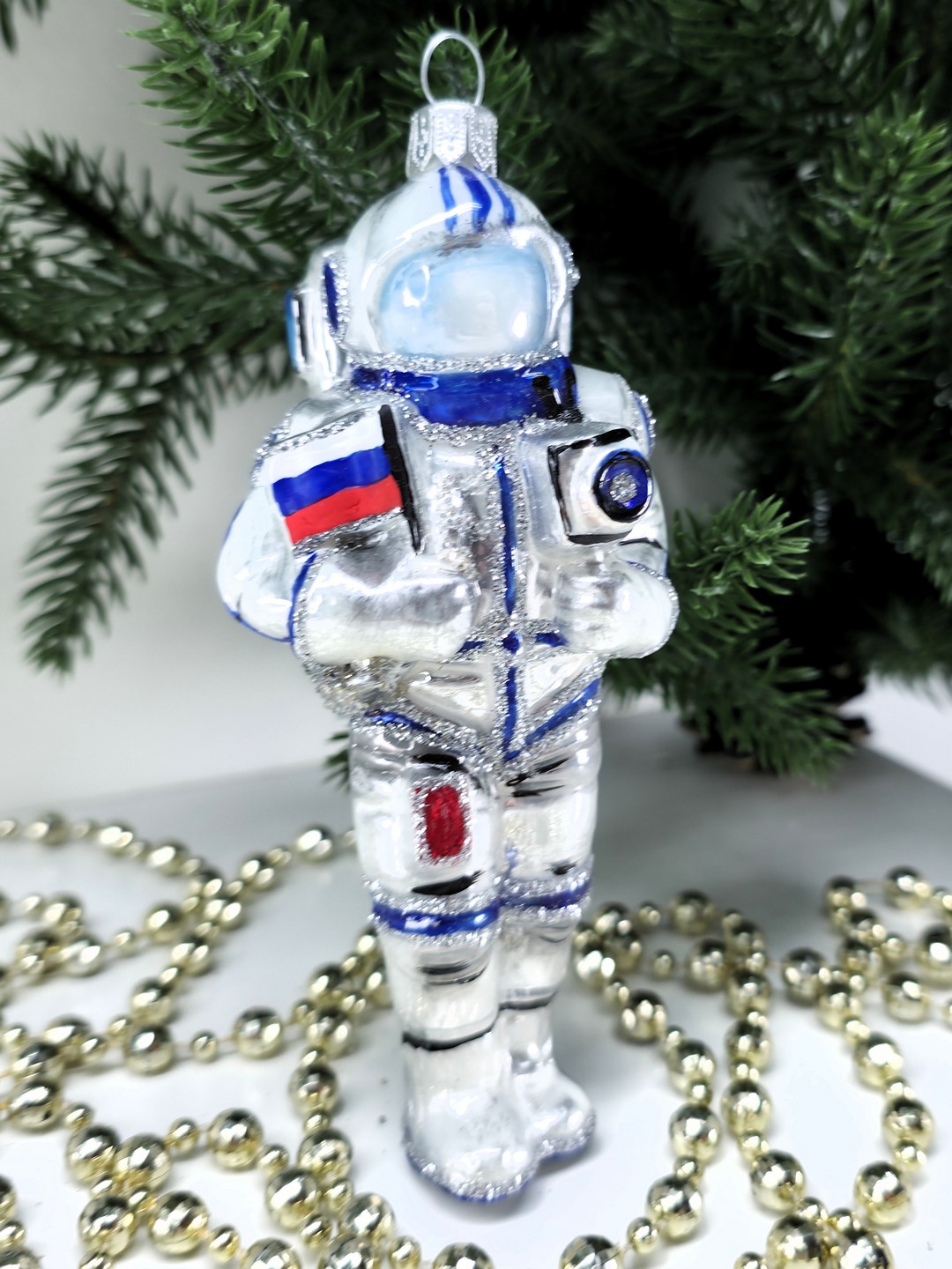 фото Стеклянная елочная игрушка Космонавт