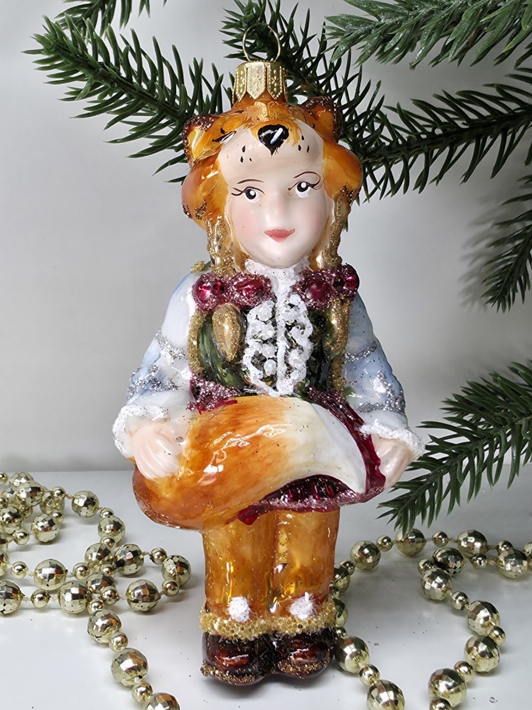фото Стеклянная елочная игрушка Девочка Лисичка