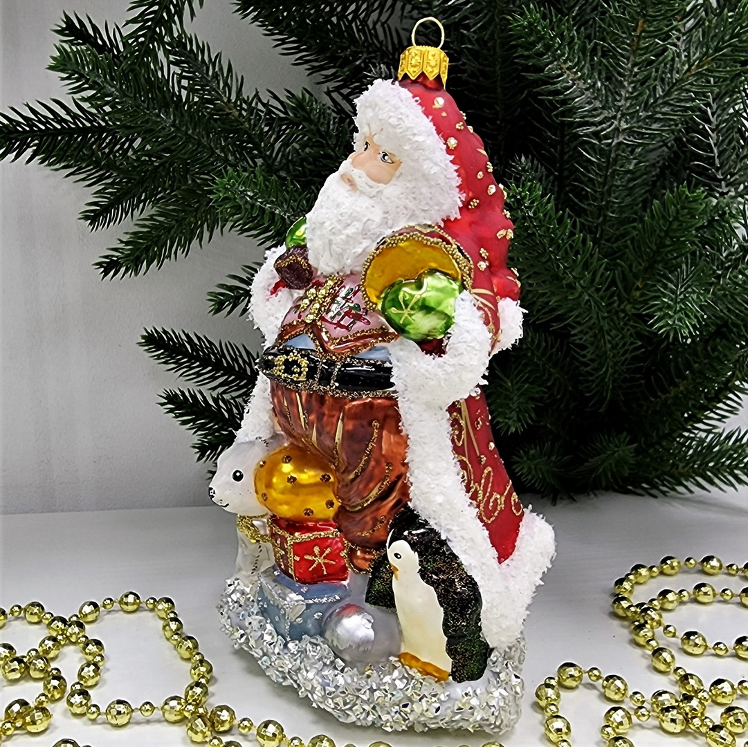 фото Стеклянная елочная игрушка Дед Мороз с пингвинами