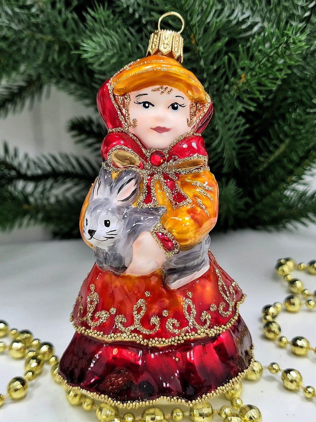 фото Стеклянная елочная игрушка Девочка с кроликом