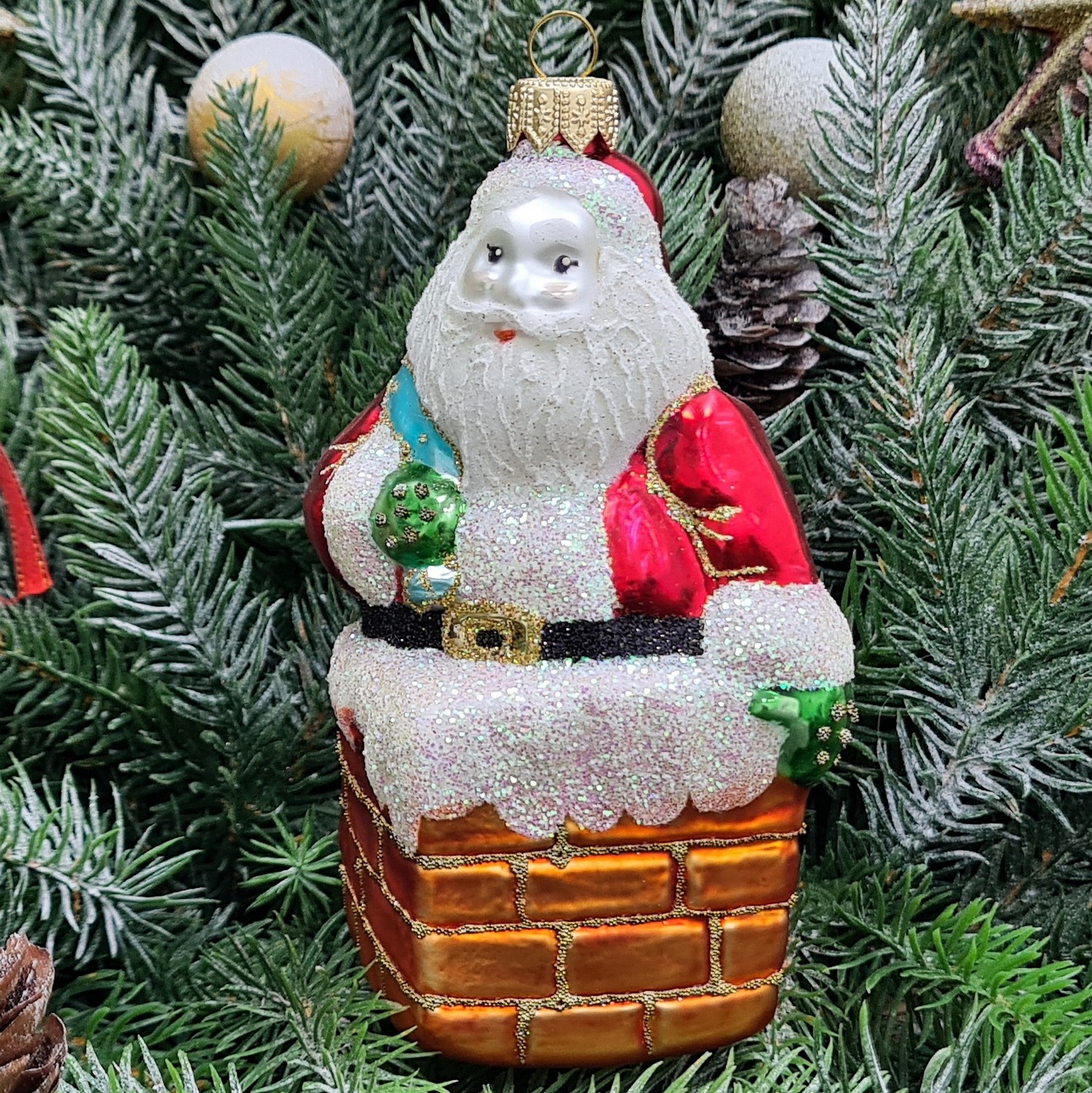 фото Стеклянная елочная игрушка Дед Мороз в трубе