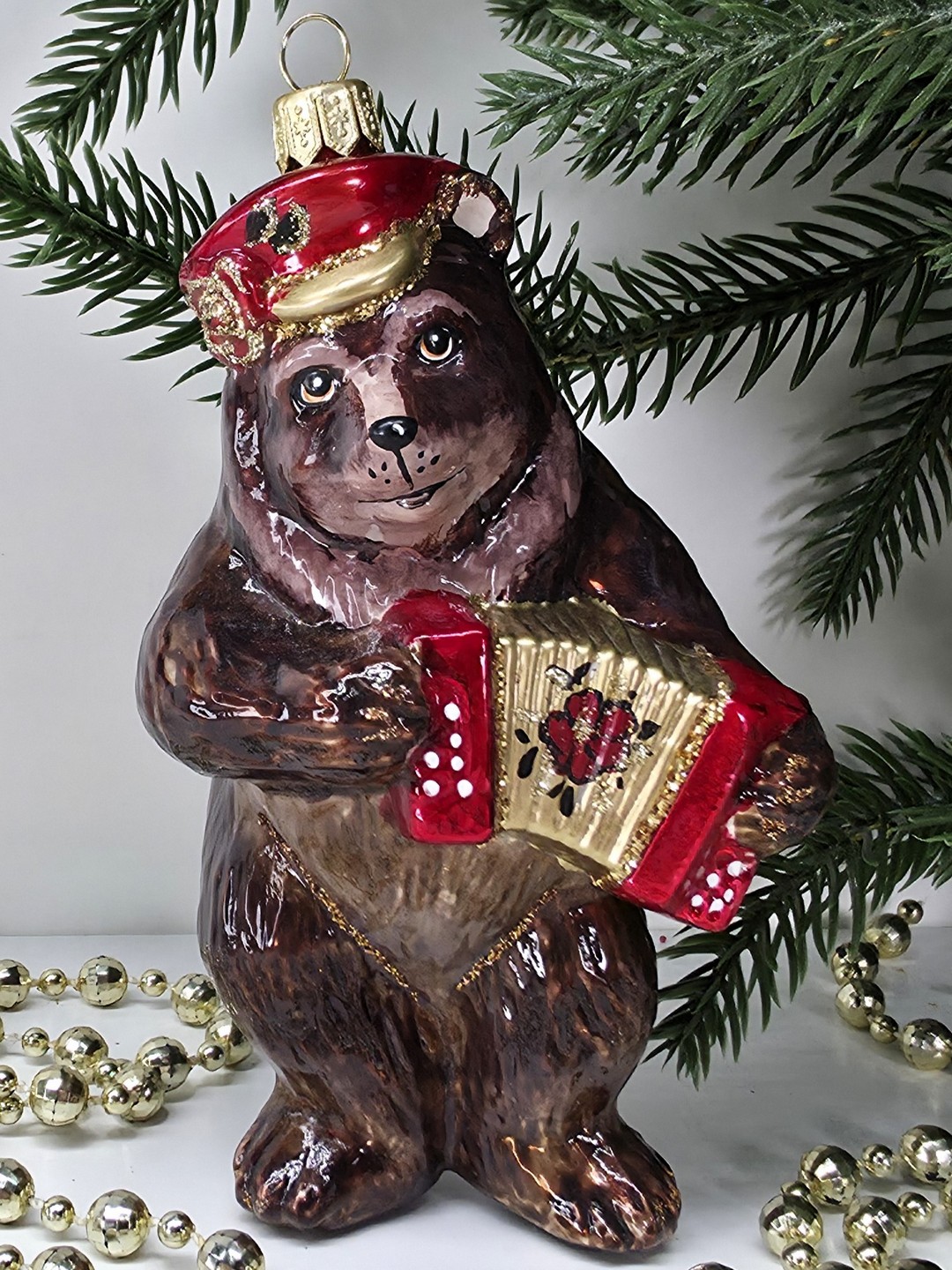 фото Стеклянная елочная игрушка Мишка с гармошкой